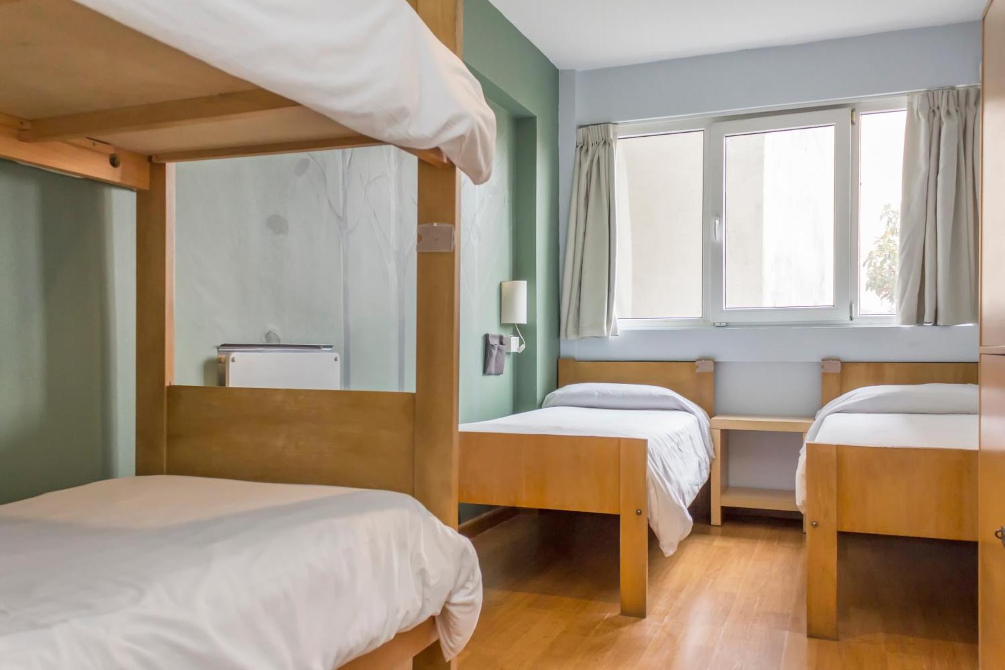 Cama em Dormitório Feminino com 4 Camas